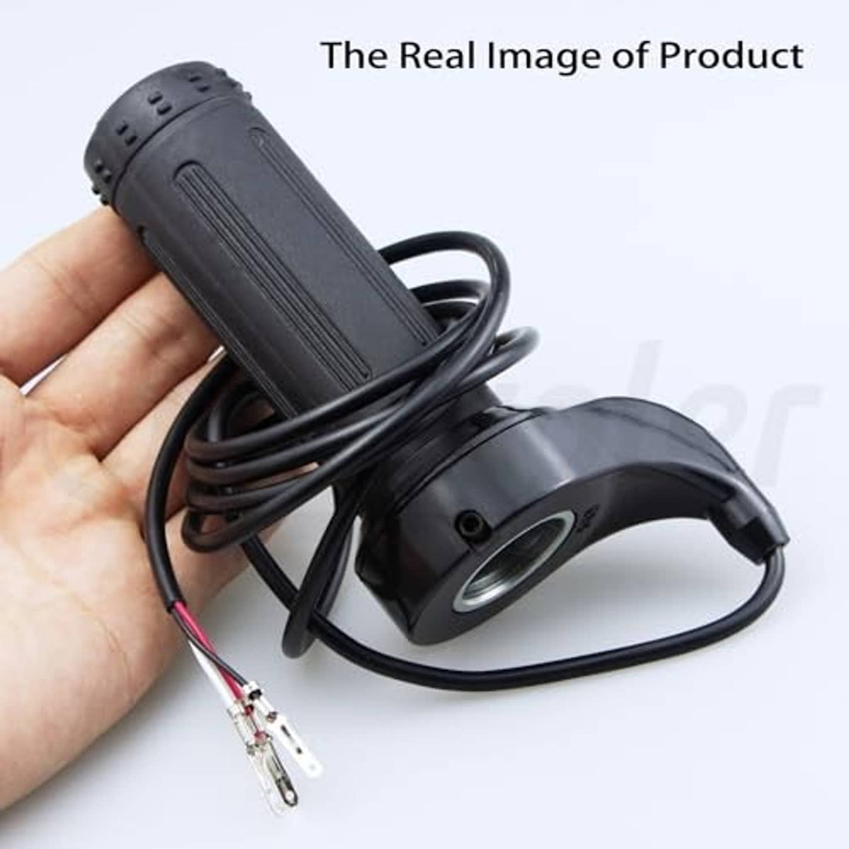 Twist throttle grip with 3-wire harness held in hand, black rubber replacement part