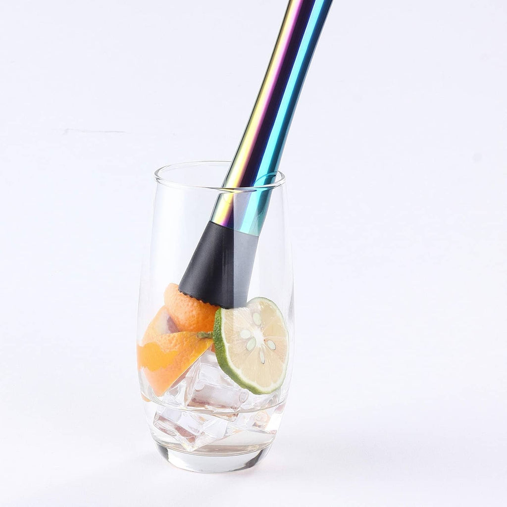 Cocktail muddler stirring in a glass with citrus slices and ice