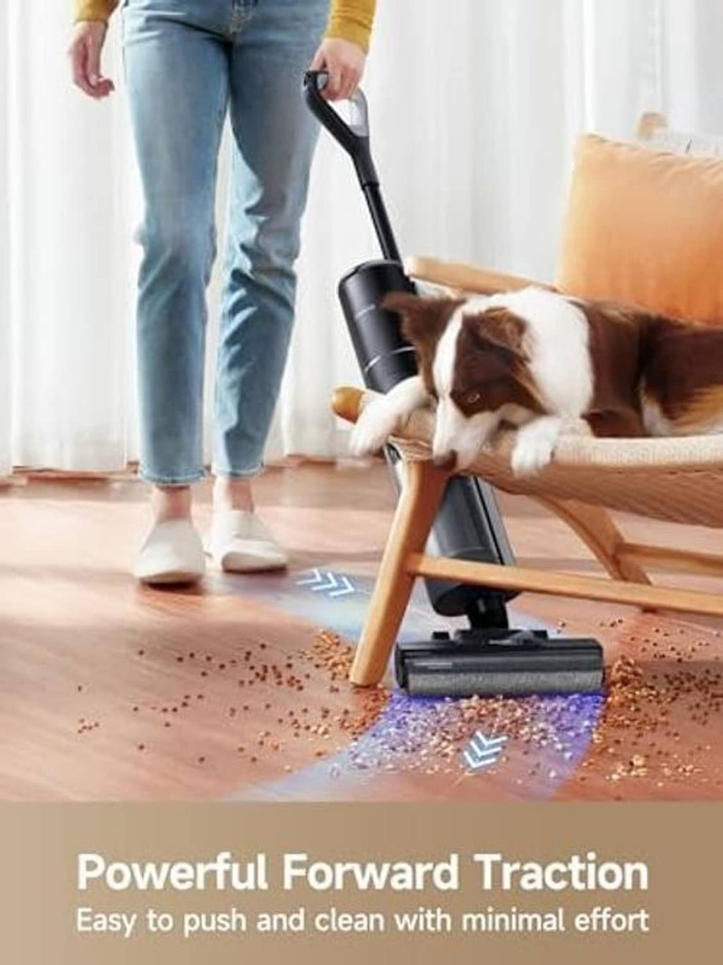 Vacuum mop with roller head removing scattered debris, upright black design