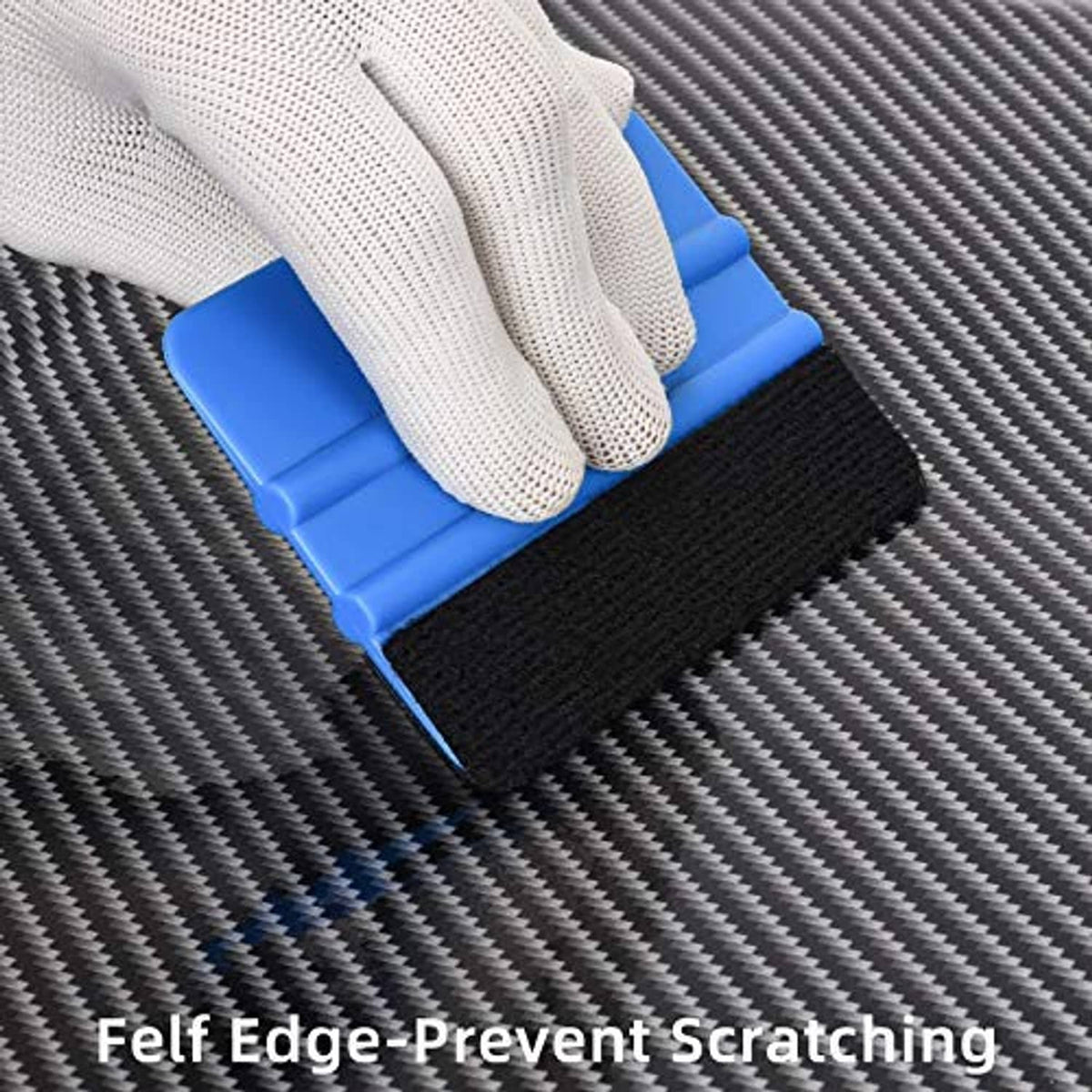 Felt edge squeegee with blue handle and black pad, gloved hand smoothing vinyl