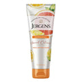 Jergens Sweet Citrus body butter tube, white with orange bottom cap and citrus graphics.