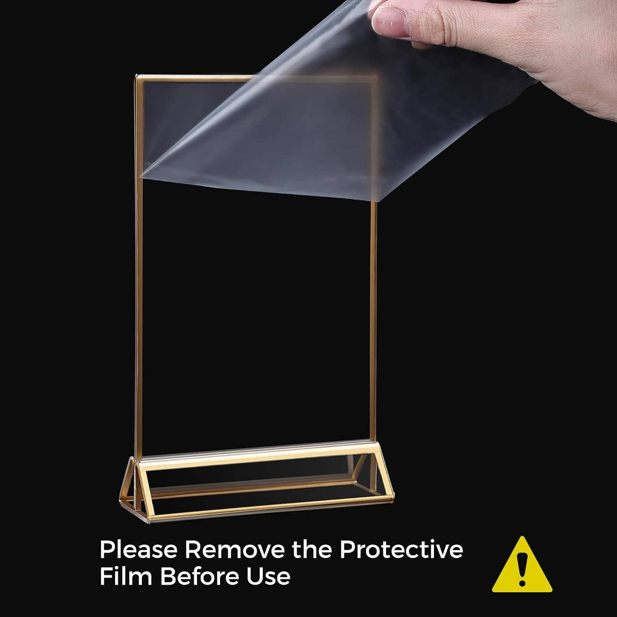 Gold 4x6 acrylic sign holder with protective film being removed, clear panel on tent stand