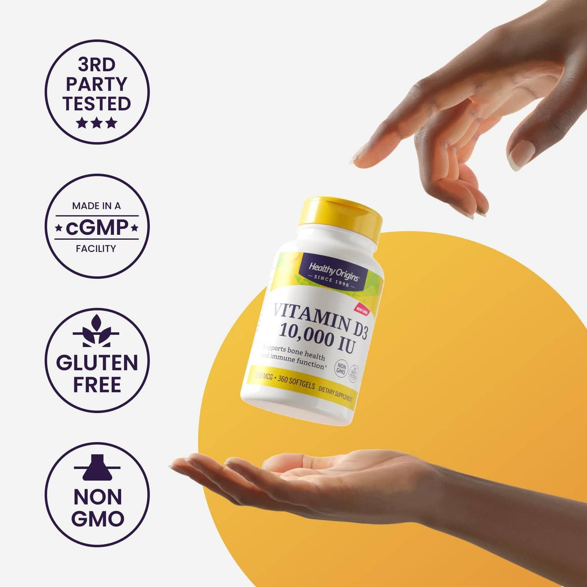 Vitamin D3 10,000 IU supplement bottle held in hands, yellow cap