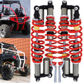 Front and rear shock absorbers with red coil springs and silver cylinders, adjustable mounts