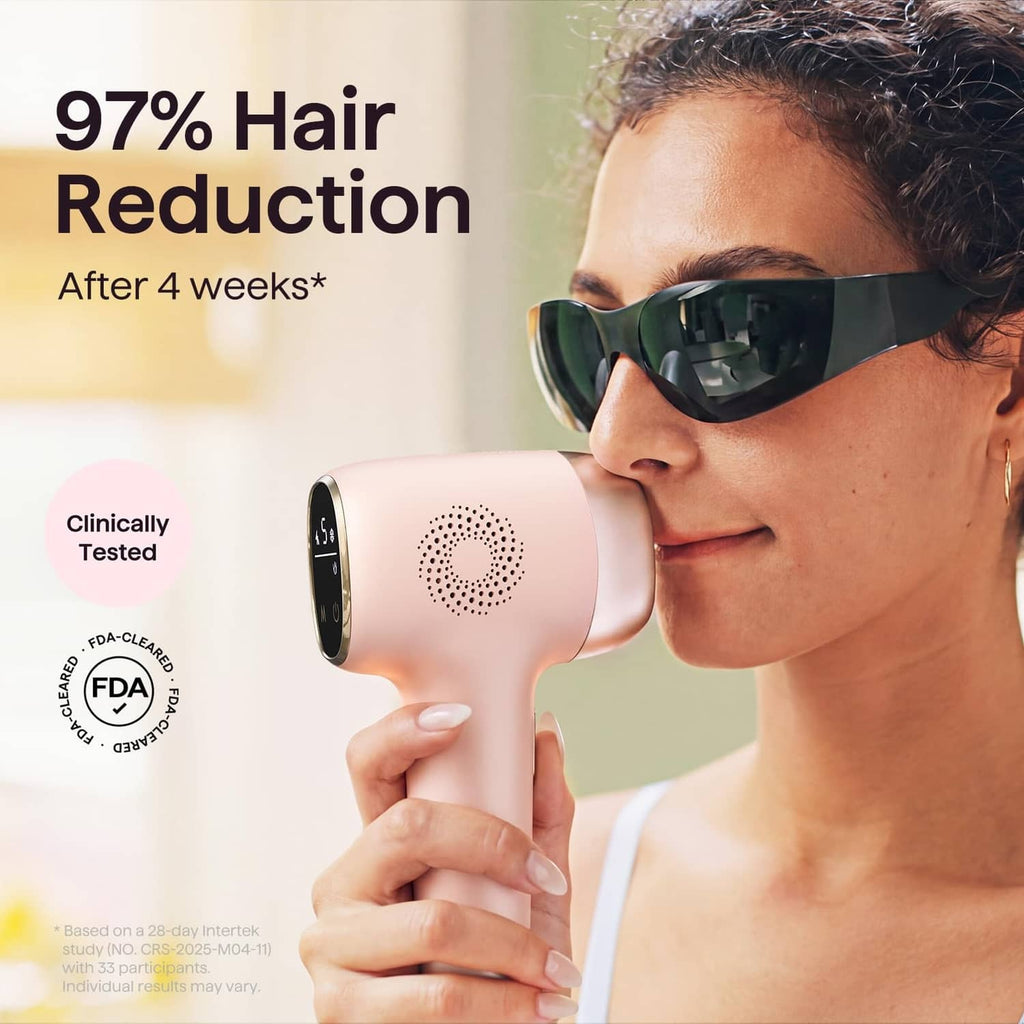 White and pink IPL hair removal device with glowing treatment window