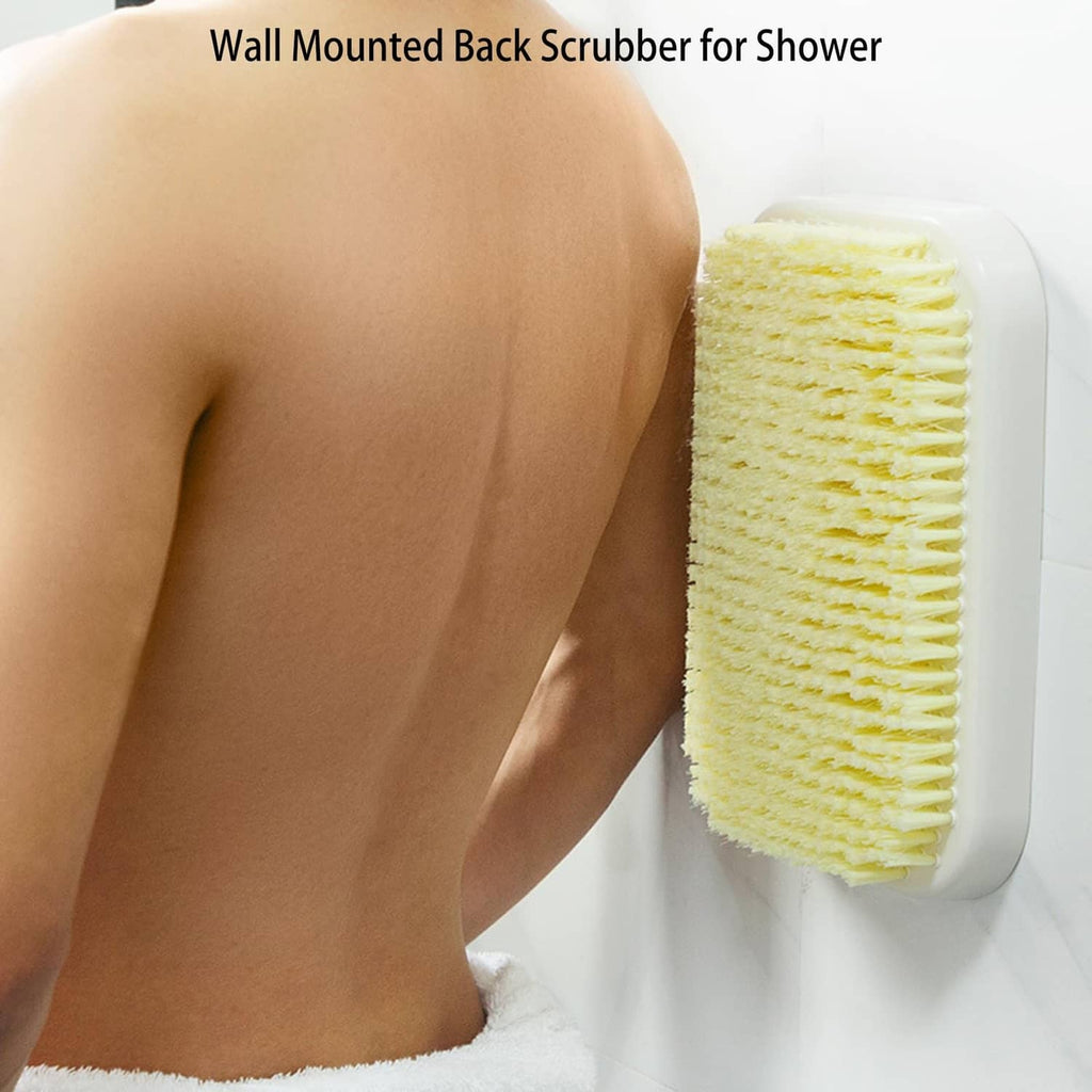 Wall-mounted back scrubber with yellow bristle pad on white mount, used on back