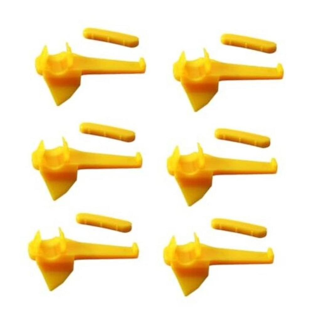 Set of yellow plastic tire changer mount/demount inserts with duck-style fork tips