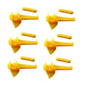 Set of yellow plastic tire changer mount/demount inserts with duck-style fork tips
