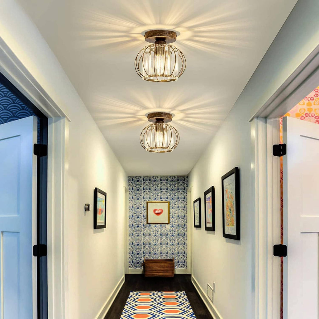 Oil-rubbed bronze semi-flush crystal ceiling light with clear glass shade and bulb glow