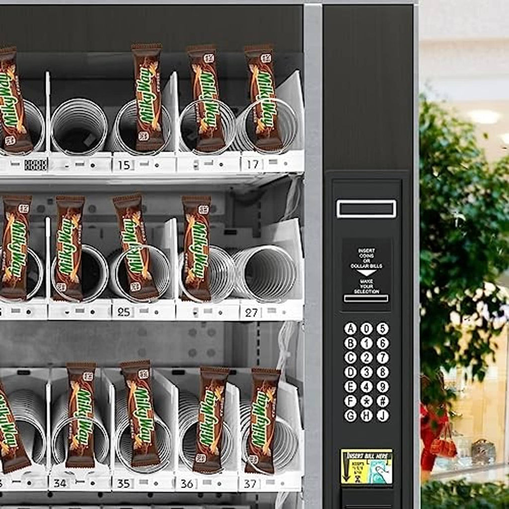 Snack vending machine stocked with Milky Way bar packs