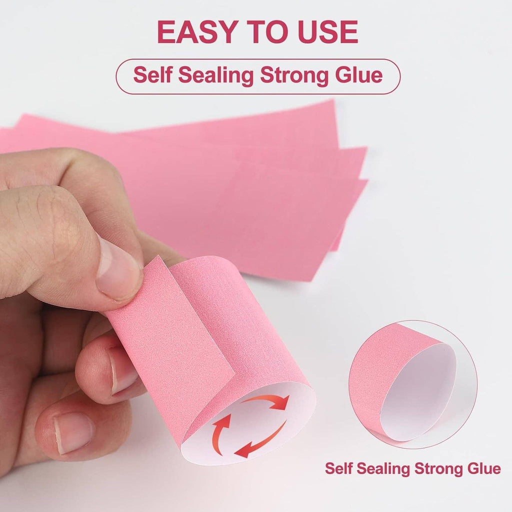 Pink self-sealing paper napkin band being attached by hand