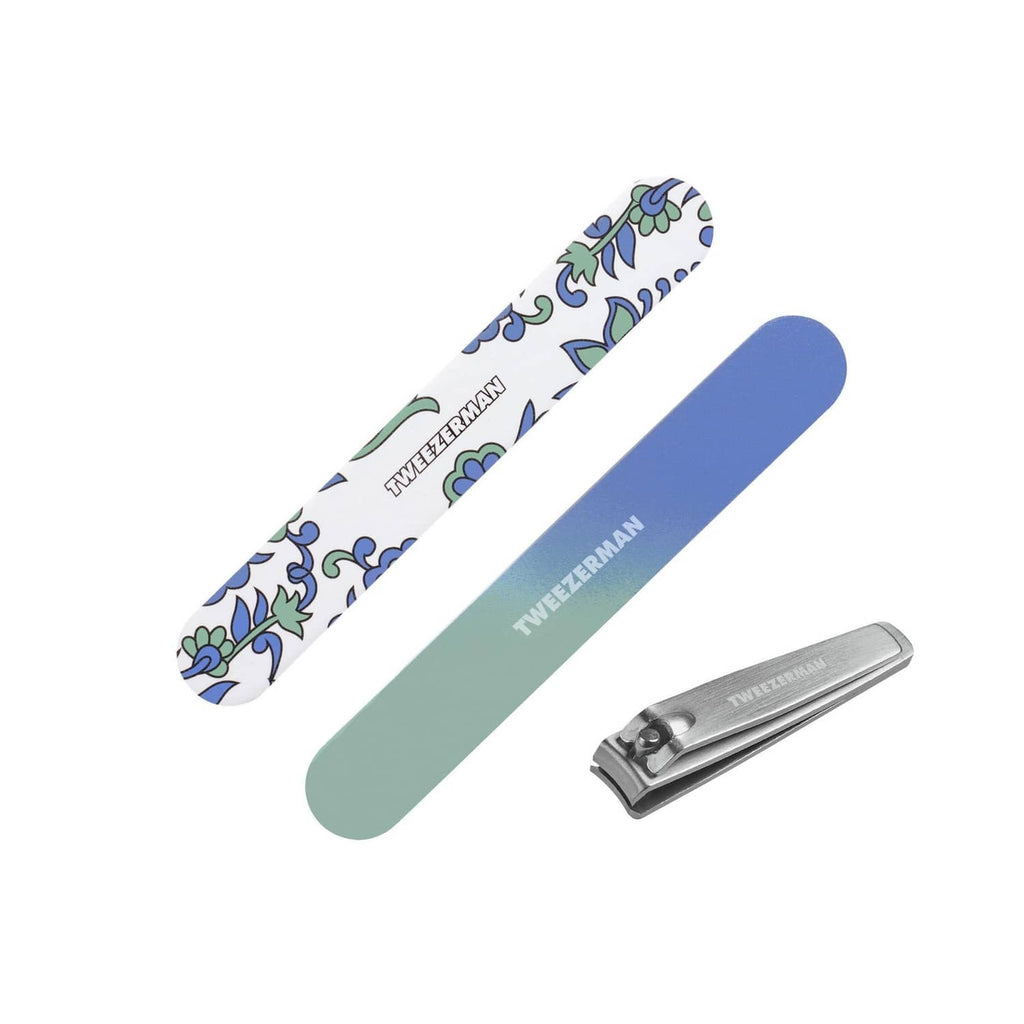 Nail care kit with two patterned nail files and metal nail clipper