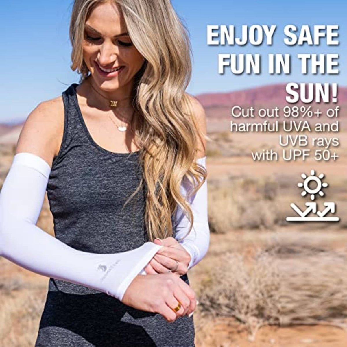 White cooling arm sleeves on woman’s arms, stretchy UPF-ready breathable fit