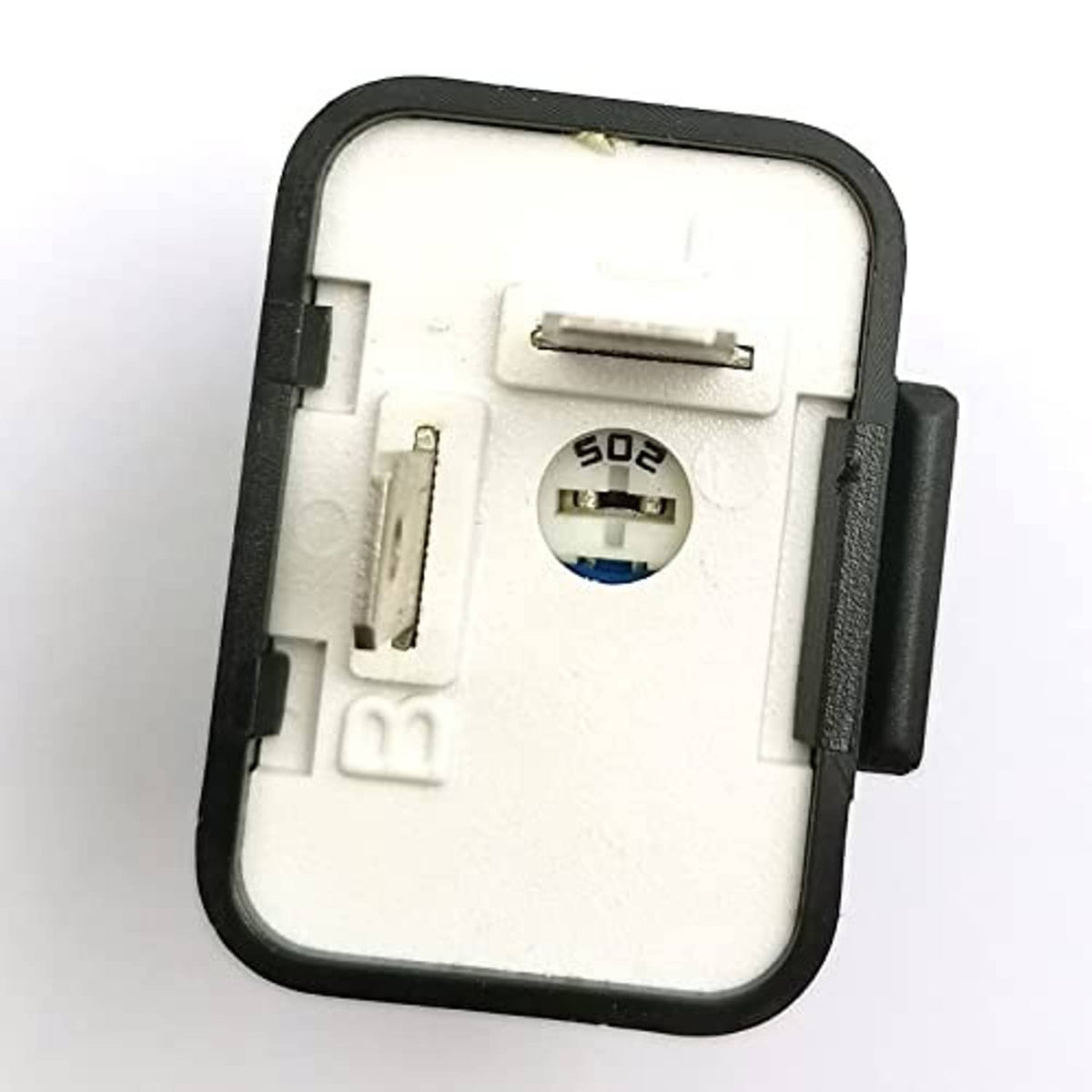 Flasher relay unit underside showing white plastic base and metal contact prongs