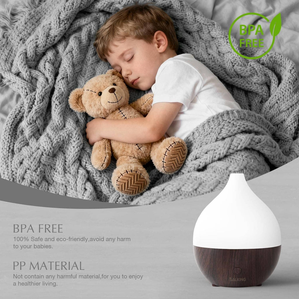 Ultrasonic essential oil diffuser with dark wood base and white top, BPA-free