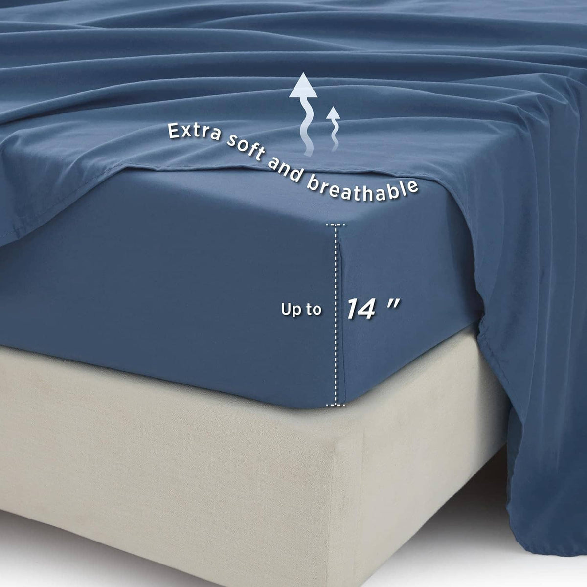Navy comforter set corner detail with smooth fabric drape over a bed