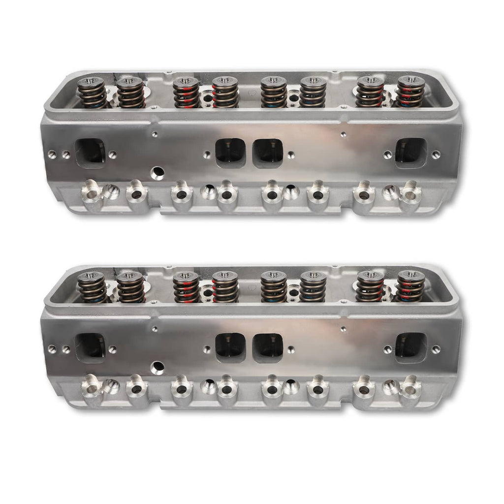 Two aluminum cylinder heads with installed valve springs and rocker posts