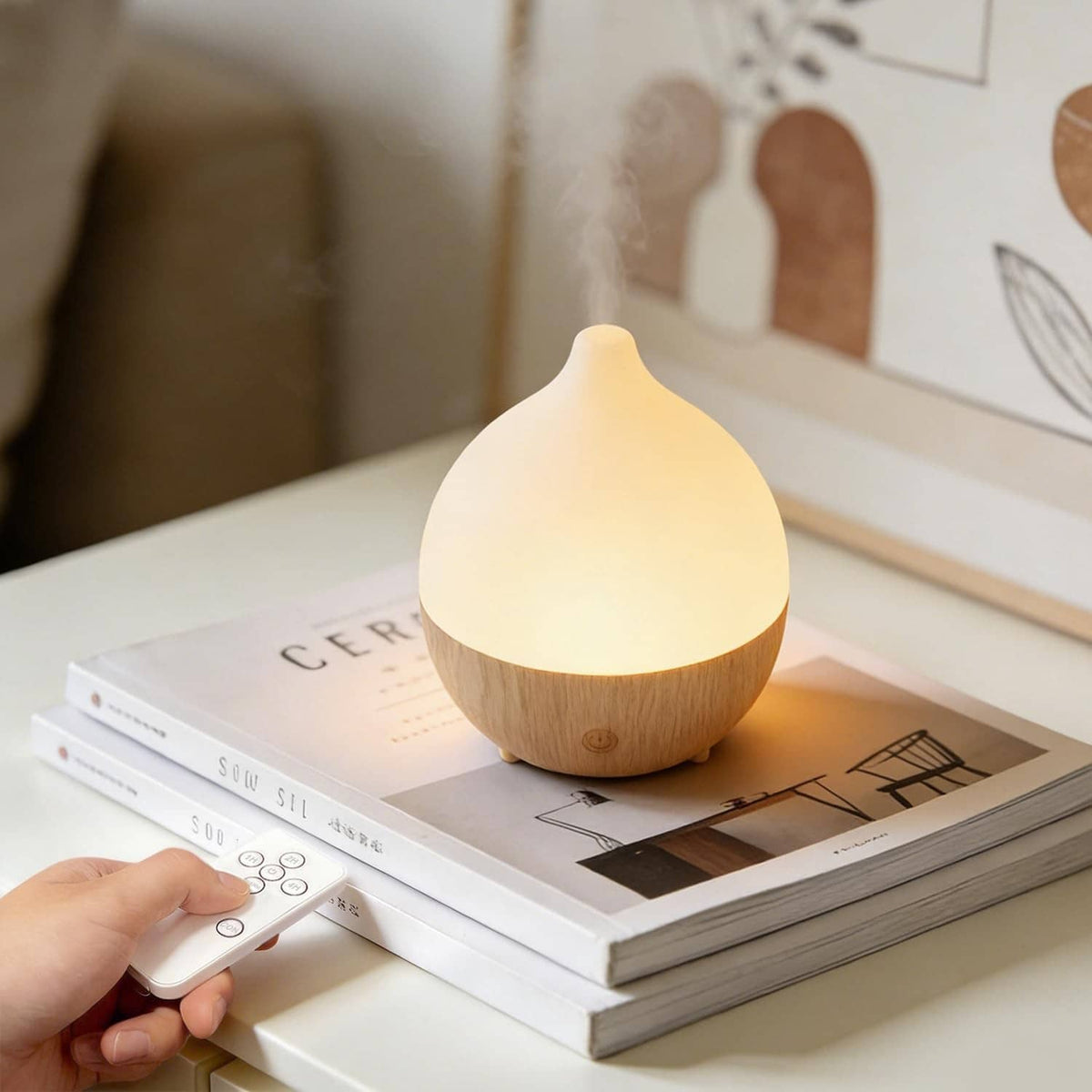 SALKING essential oil diffuser with warm LED glow on a bedside table