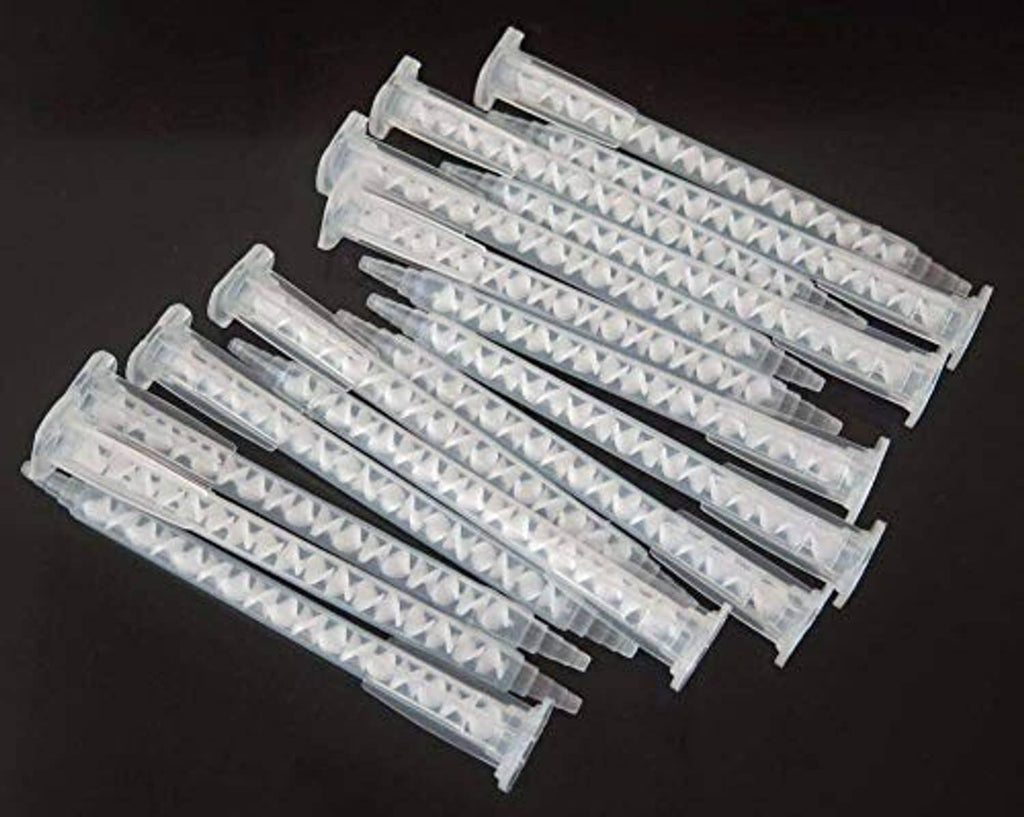 Clear static mixer nozzle tips for epoxy adhesive, several units laid out
