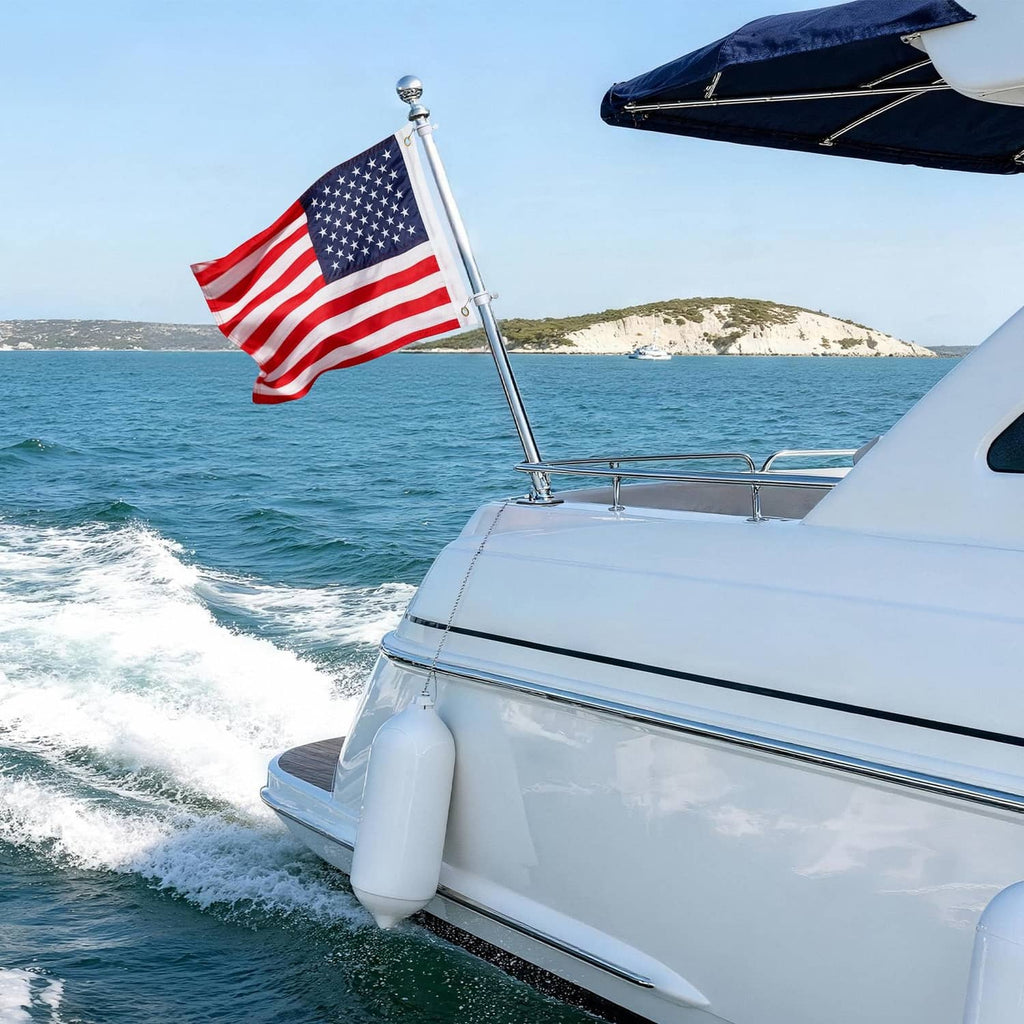 Embroidered American boat flag with blue star field and red-and-white stripes on a pole