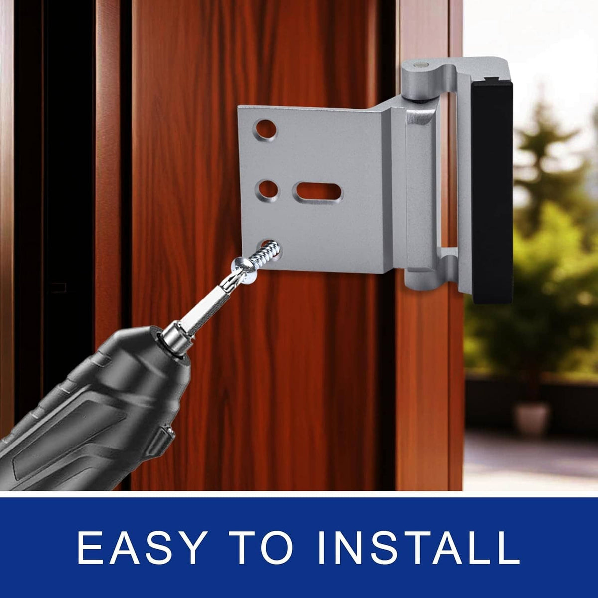 Silver door reinforcement lock with mounting bracket and key, close-up