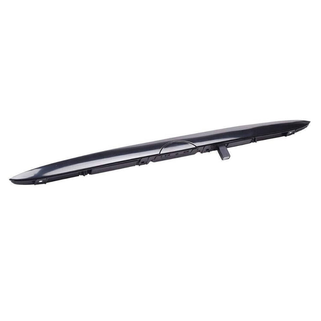 Black tailgate grip handle trim underside profile with central ridge and tabs