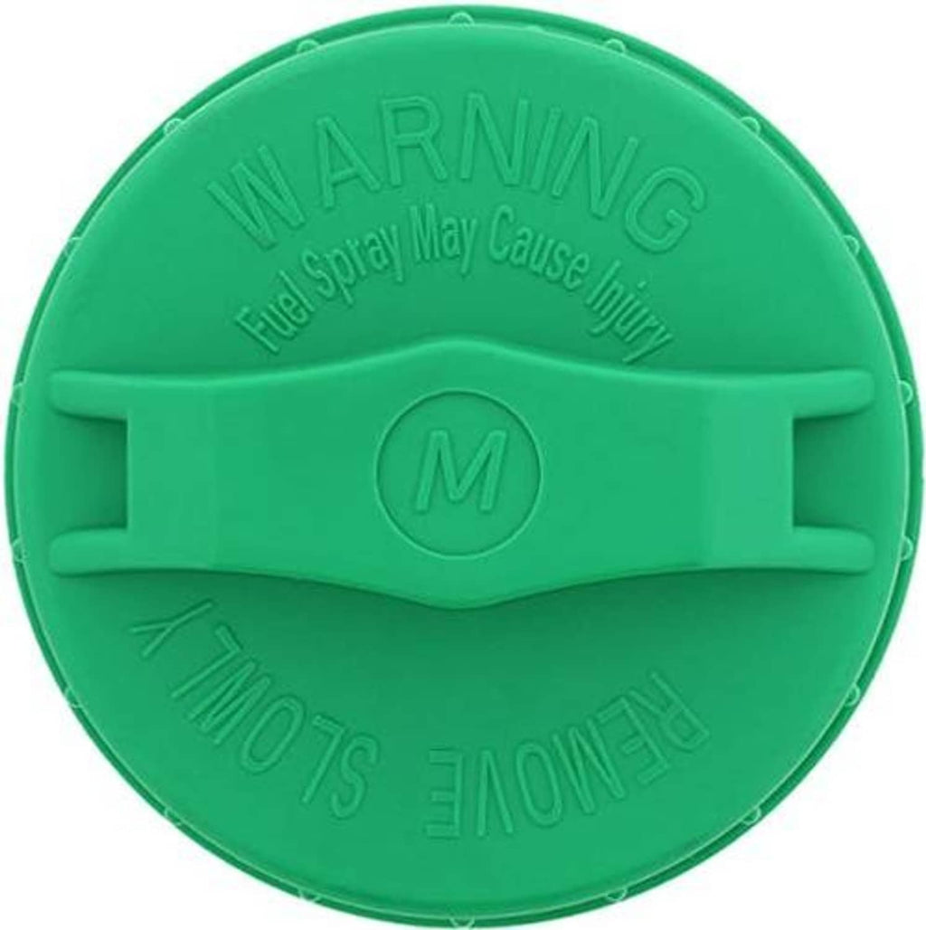 Green fuel tank cap underside with WARNING and 'Fuel Spray May Cause Injury' text