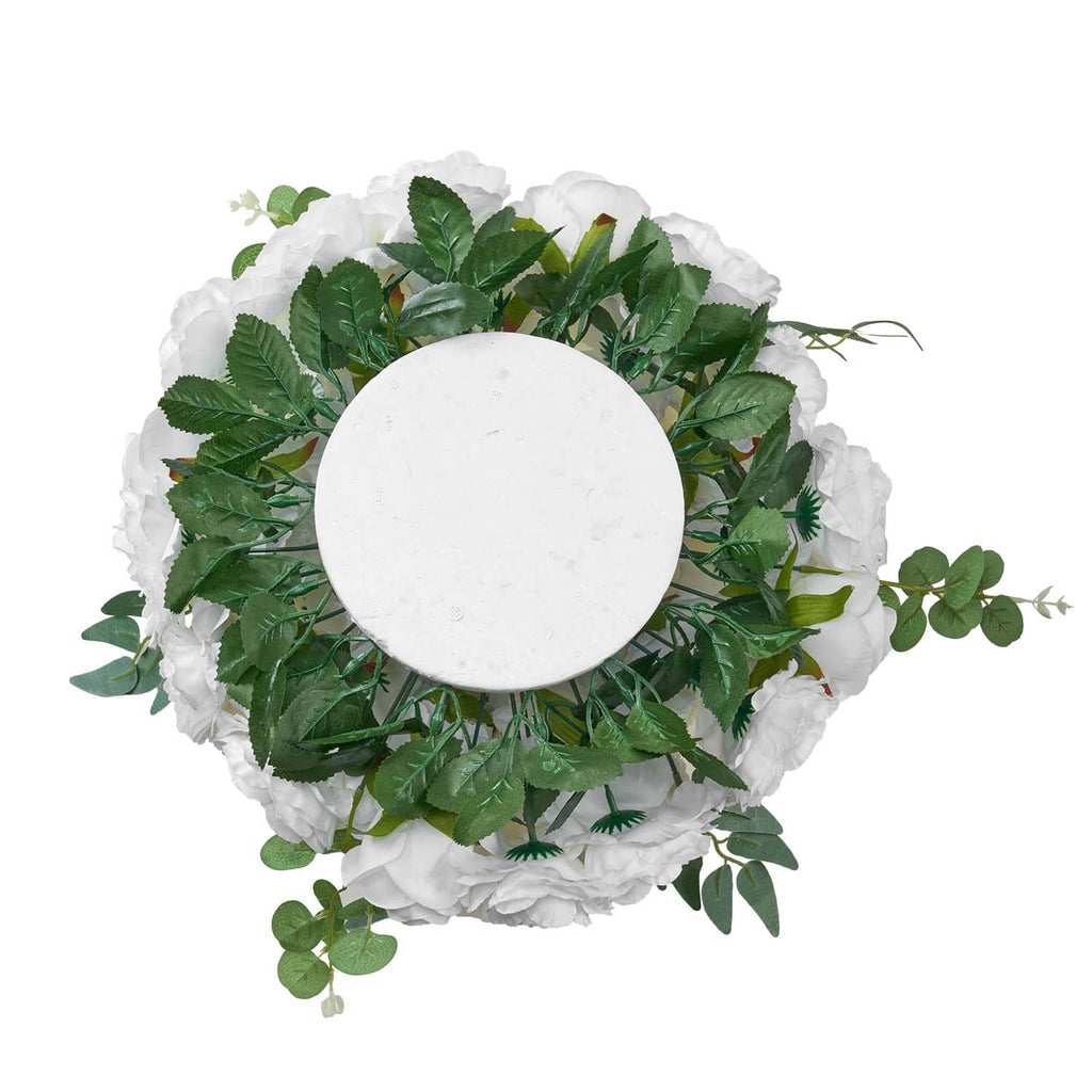 Artificial flower ball with green foliage and white ruffle edges, front view