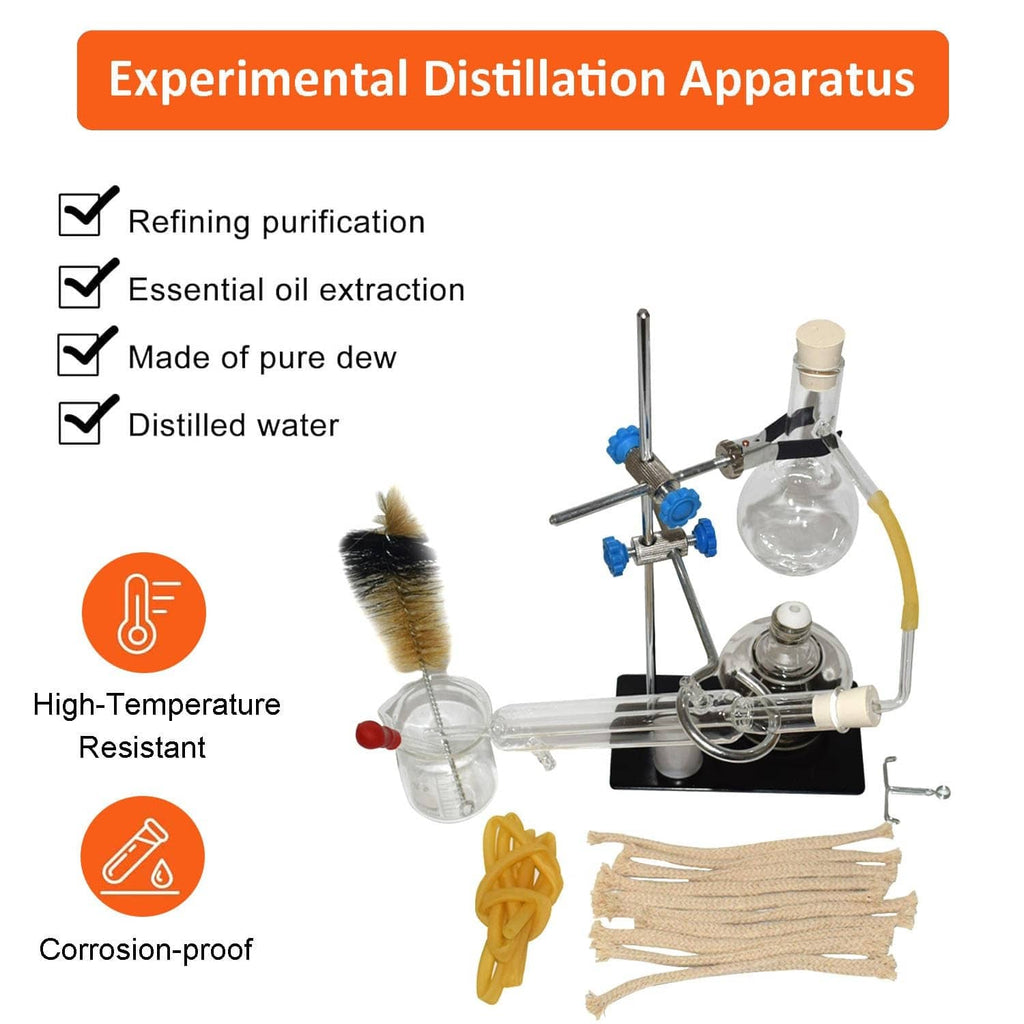 Experimental distillation apparatus with glass round flasks, clamps, tubing, and tools