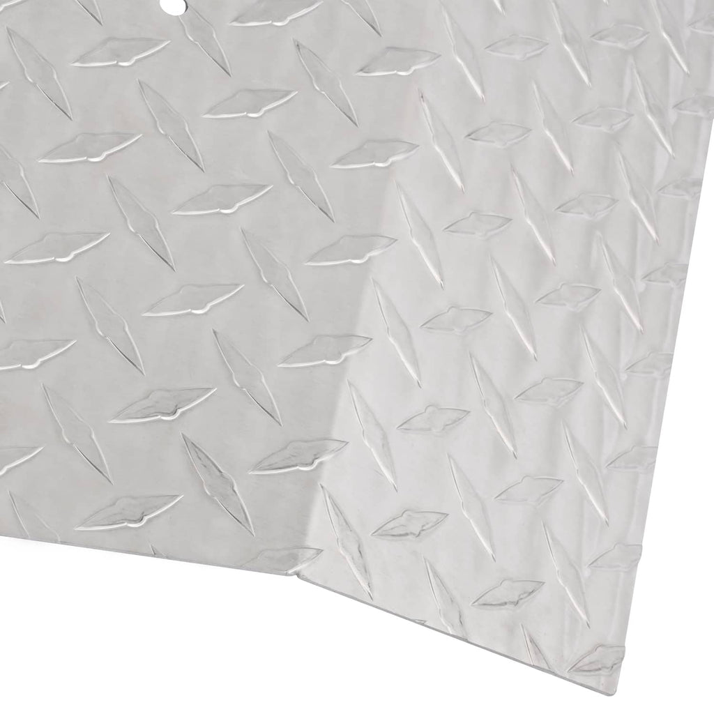 Aluminum diamond plate panel close-up, silver with raised diamond pattern and edge hole
