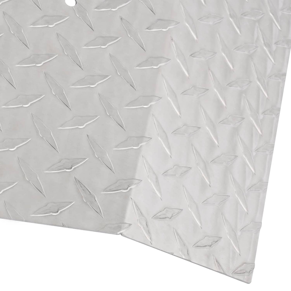 Aluminum diamond plate panel close-up, silver with raised diamond pattern and edge hole