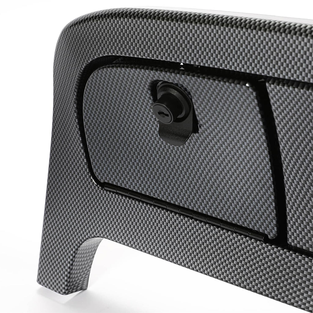 Close-up of dark gray carbon-fiber dash cover with corner access panel