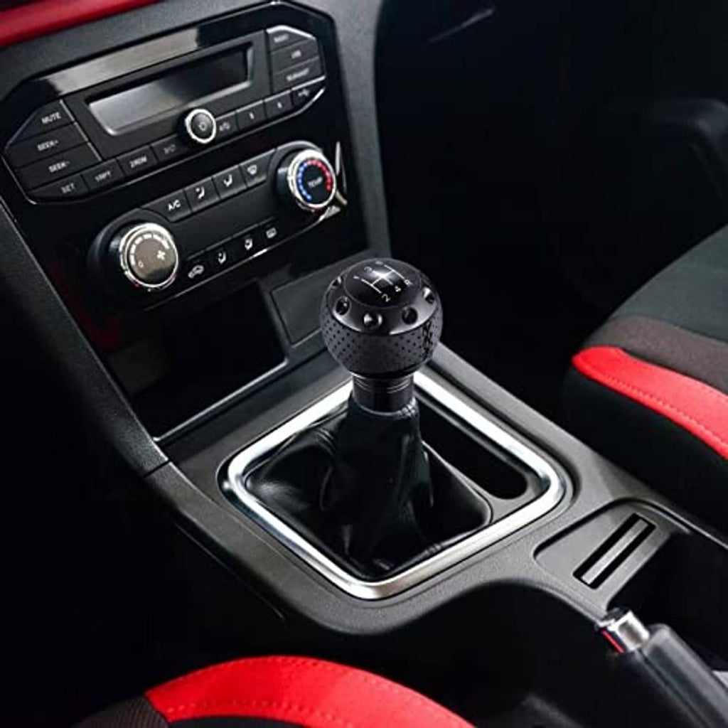 Black leather-look gear shifter knob installed in car center console