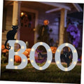 Outdoor Halloween solar yard sign set with glowing BOO letters and spooky silhouettes