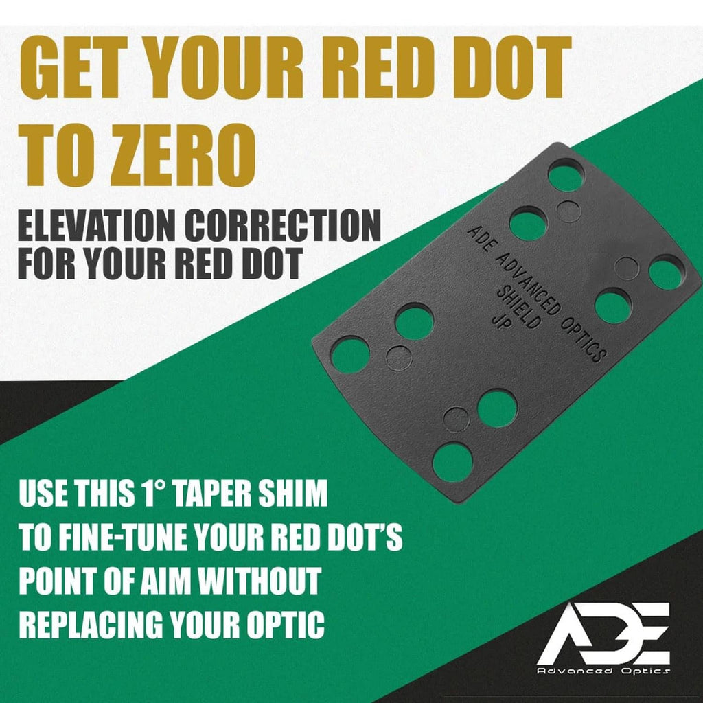 Dark gray optic shim plate with round holes and green inserts