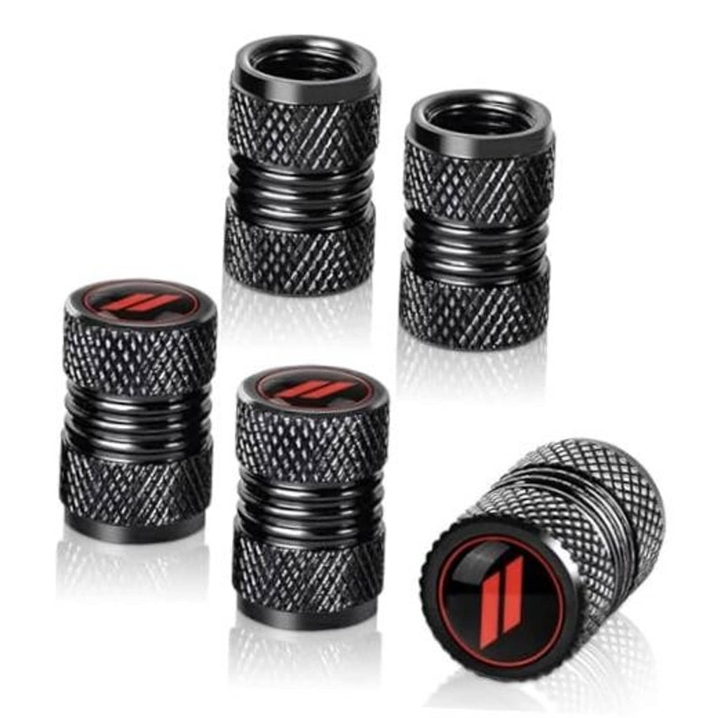 Black metal tire valve caps set with textured grip and red logo inserts