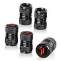 Black metal tire valve caps set with textured grip and red logo inserts