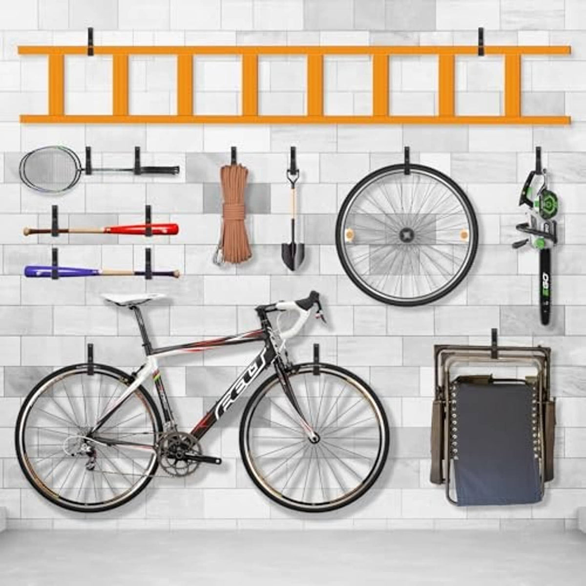 Wall-mounted steel hook set with several black U-hooks holding tools and gear