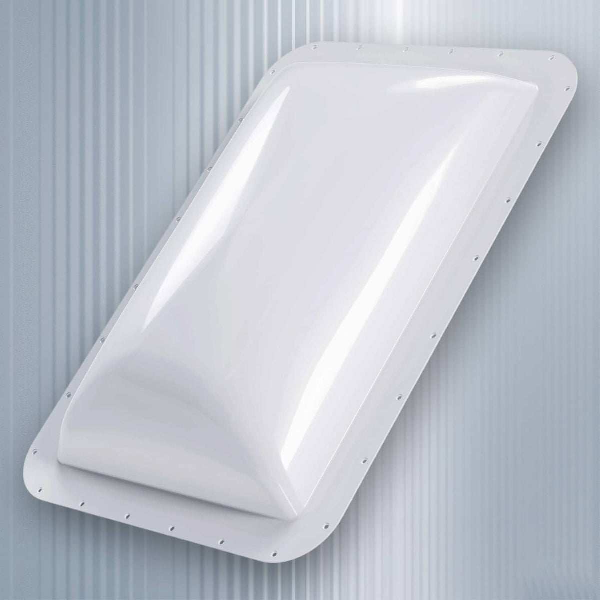 White skylight cover installed on a slanted roof with mounting holes visible on edges