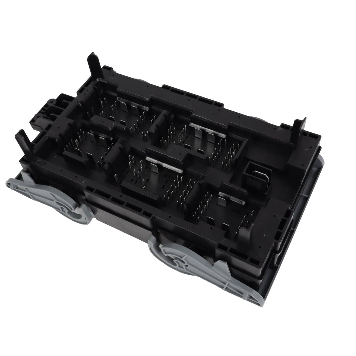Vehicle fuse relay junction block underside and internal connector channels, angled