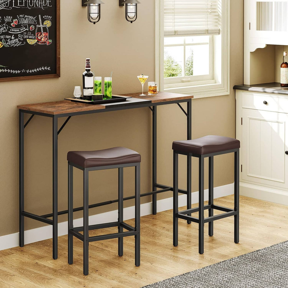 Two bar stools with dark brown cushioned seats and black frames near a kitchen counter.