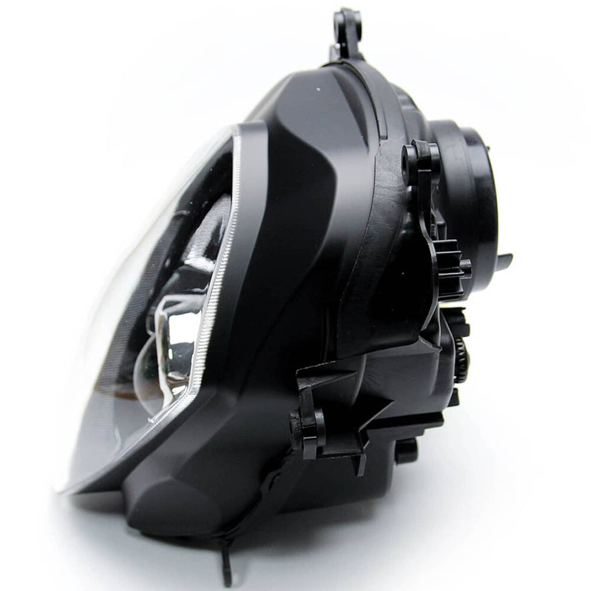 Headlight assembly side profile with clear lens opening and black mounting brackets