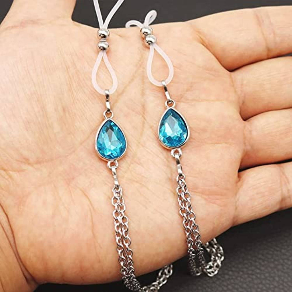 Non-piercing nipple jewelry on hand: blue teardrop drops with silver chain loops