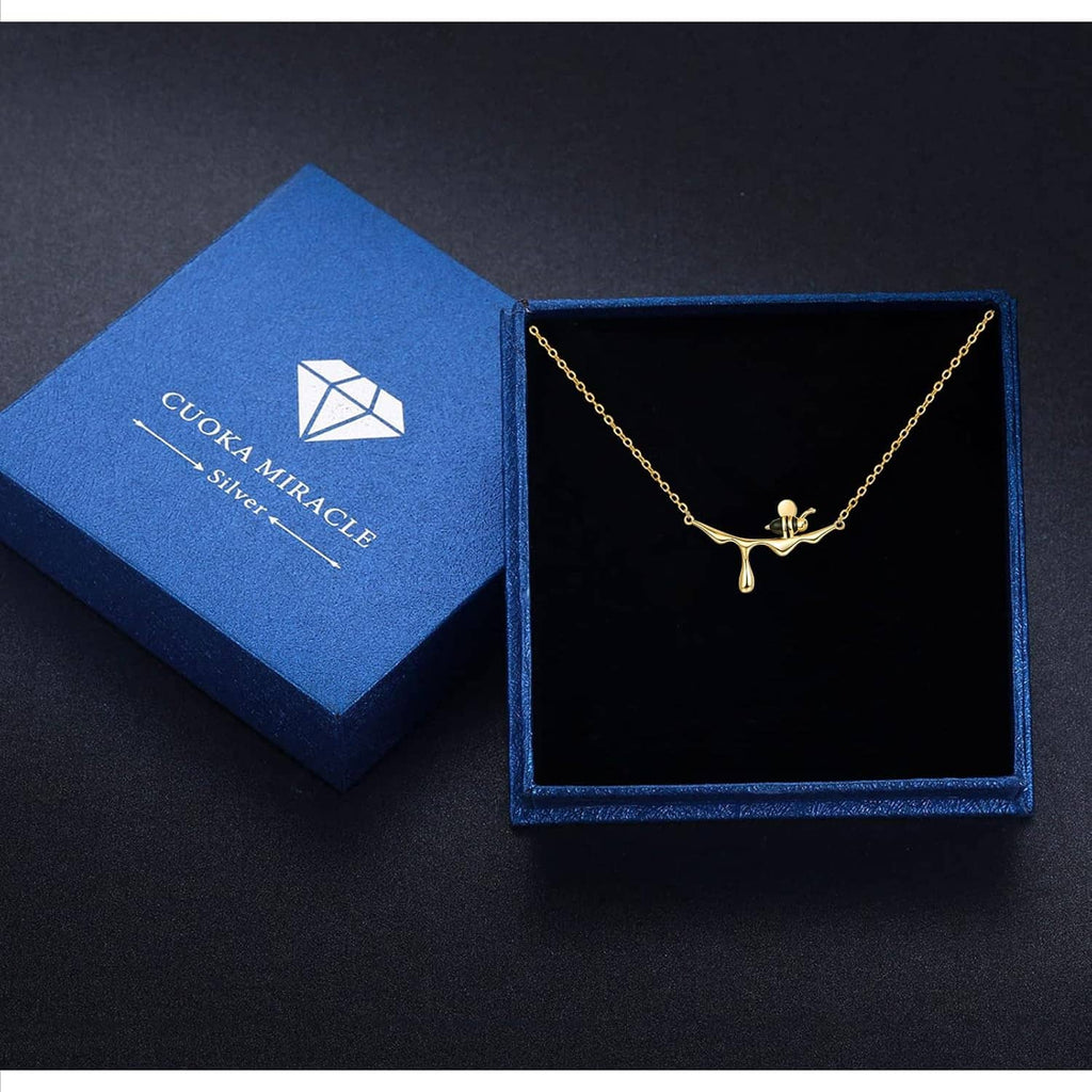 Bee pendant necklace in a gift box with gold-tone finish and thin chain