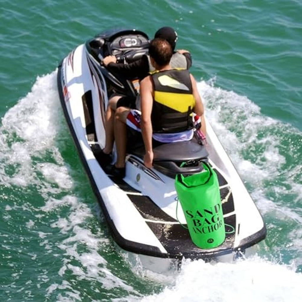 Green sand bag anchor secured on a jet ski deck with braided rope