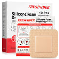 Silicone foam dressing with adhesive border, beige square pad