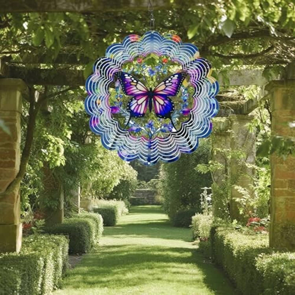 Butterfly wind spinner with multicolor scalloped rings hanging over a garden path.