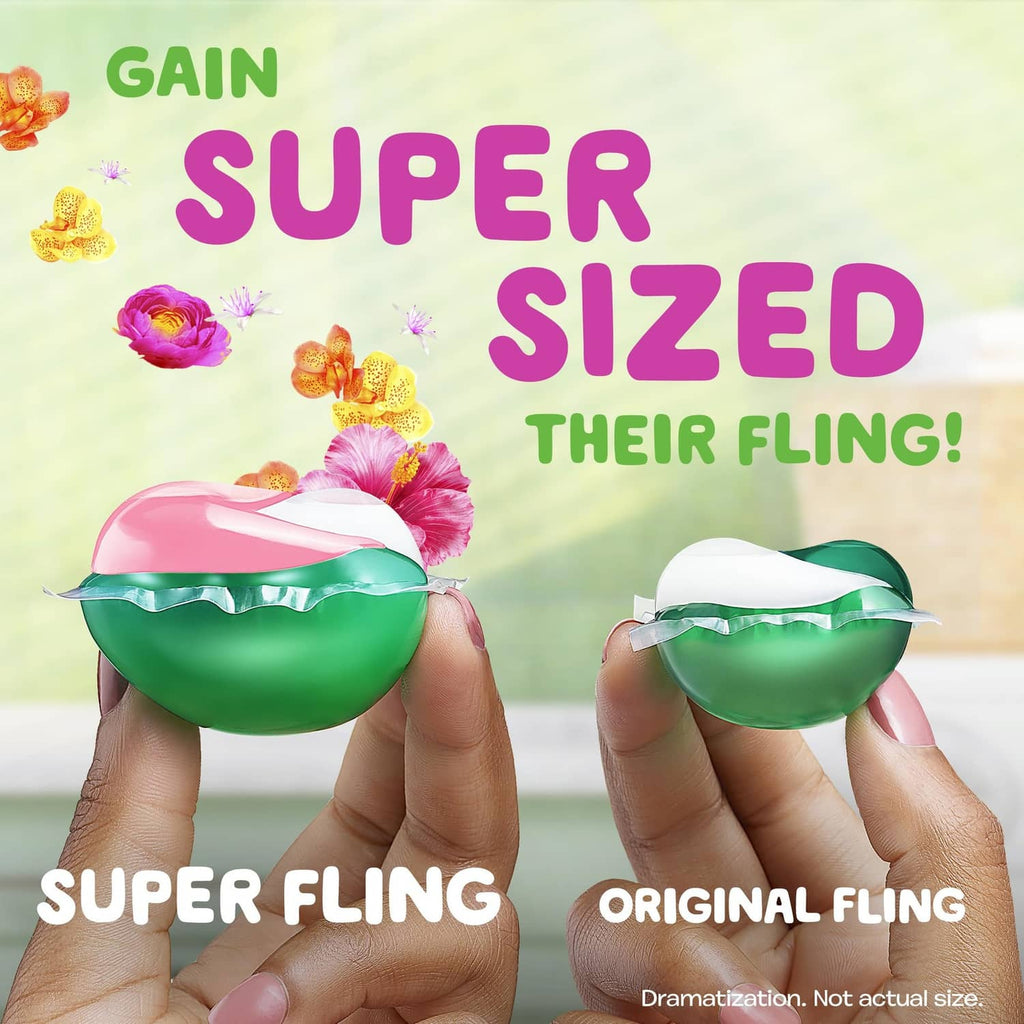Laundry detergent pacs, two green-and-white Super Fling pods held in hands