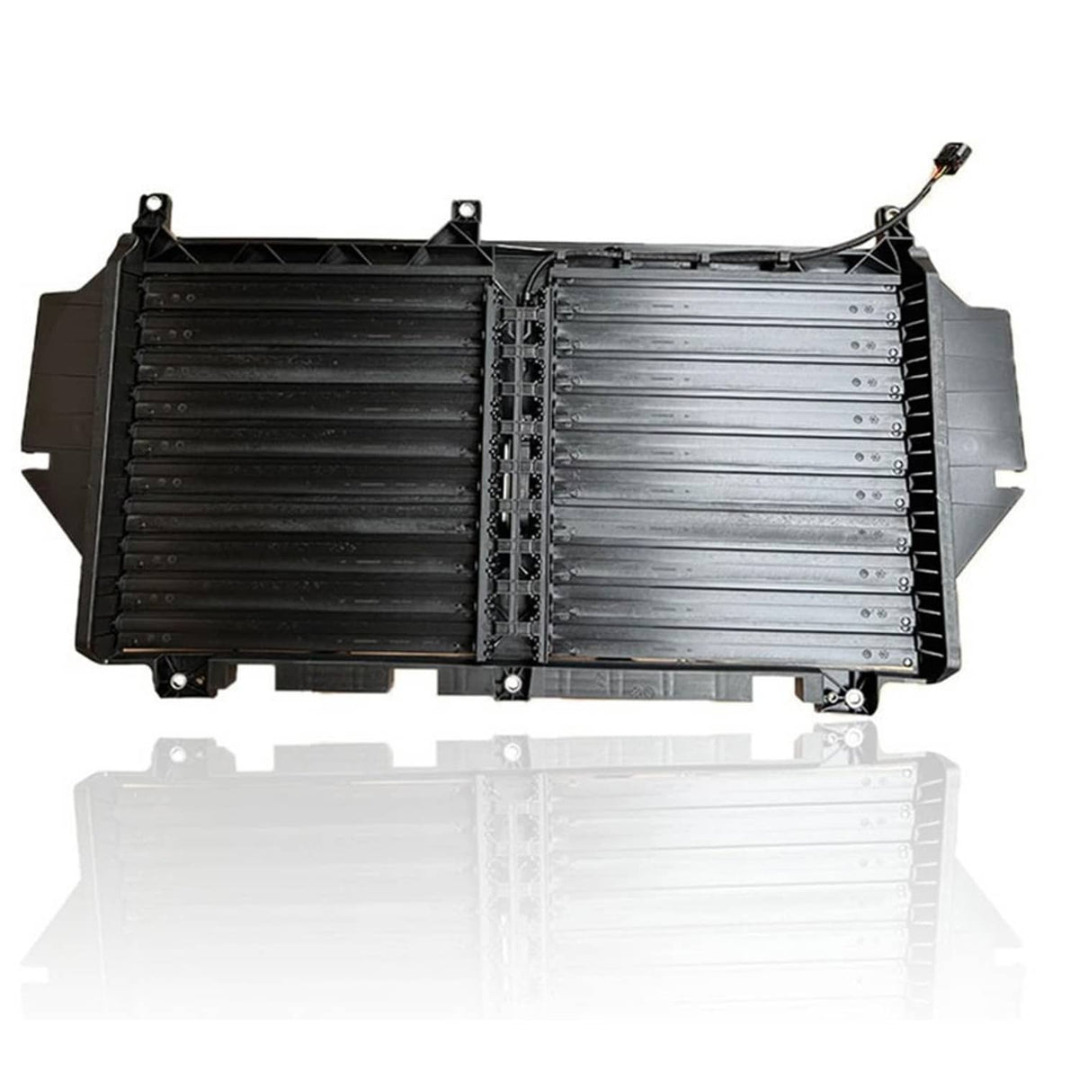 Active air grille shutter assembly with black and silver panels and wiring on right side