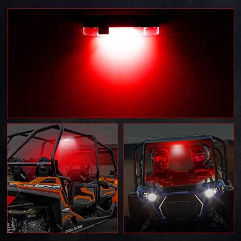 Universal roll bar LED interior light glowing red in utility vehicle cabin